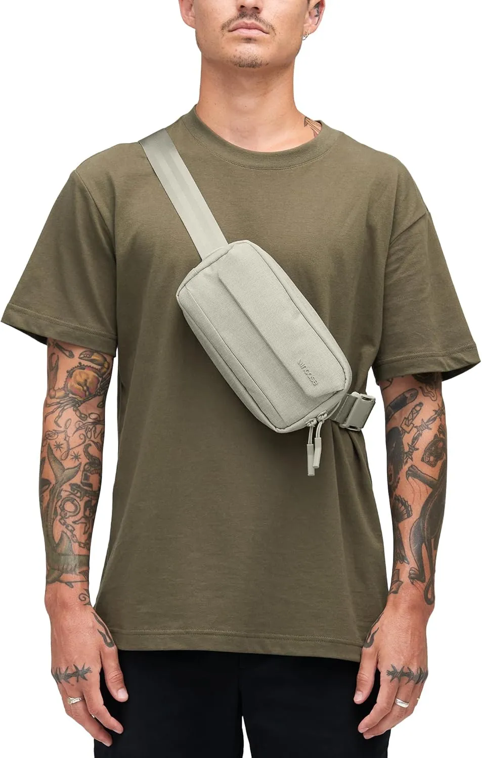Incase Crosstown Sling - Compact, Durable and Lightweight, Crossbody & Hip Carry, Faux Fur Device Pocket, Easy Access Pockets