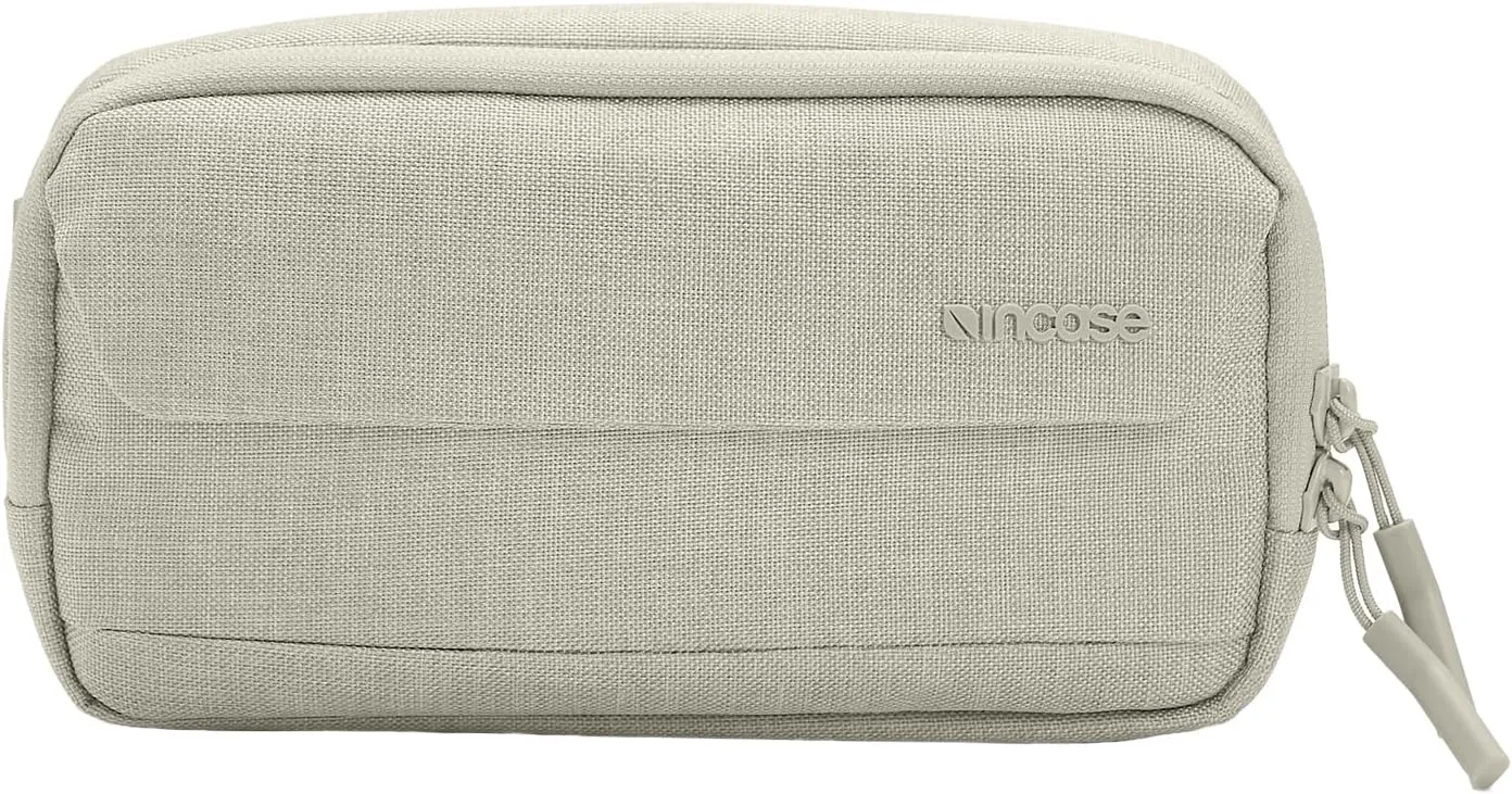 Incase Crosstown Sling - Compact, Durable and Lightweight, Crossbody & Hip Carry, Faux Fur Device Pocket, Easy Access Pockets