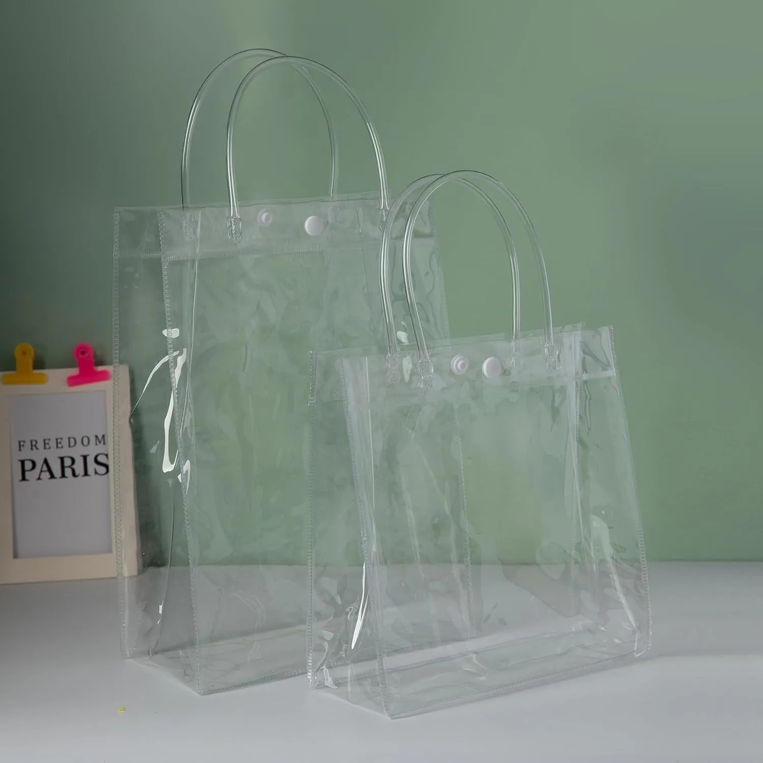 SHIPKEY 10 Pack 8”x4”x11” Clear Gift Bags, Transparent Gift Bag with Handles, Waterproof PVC Shopping Bags for Candy Perfume Boutique Gift Wedding Birthday Party Favor (20x10x28cm)
