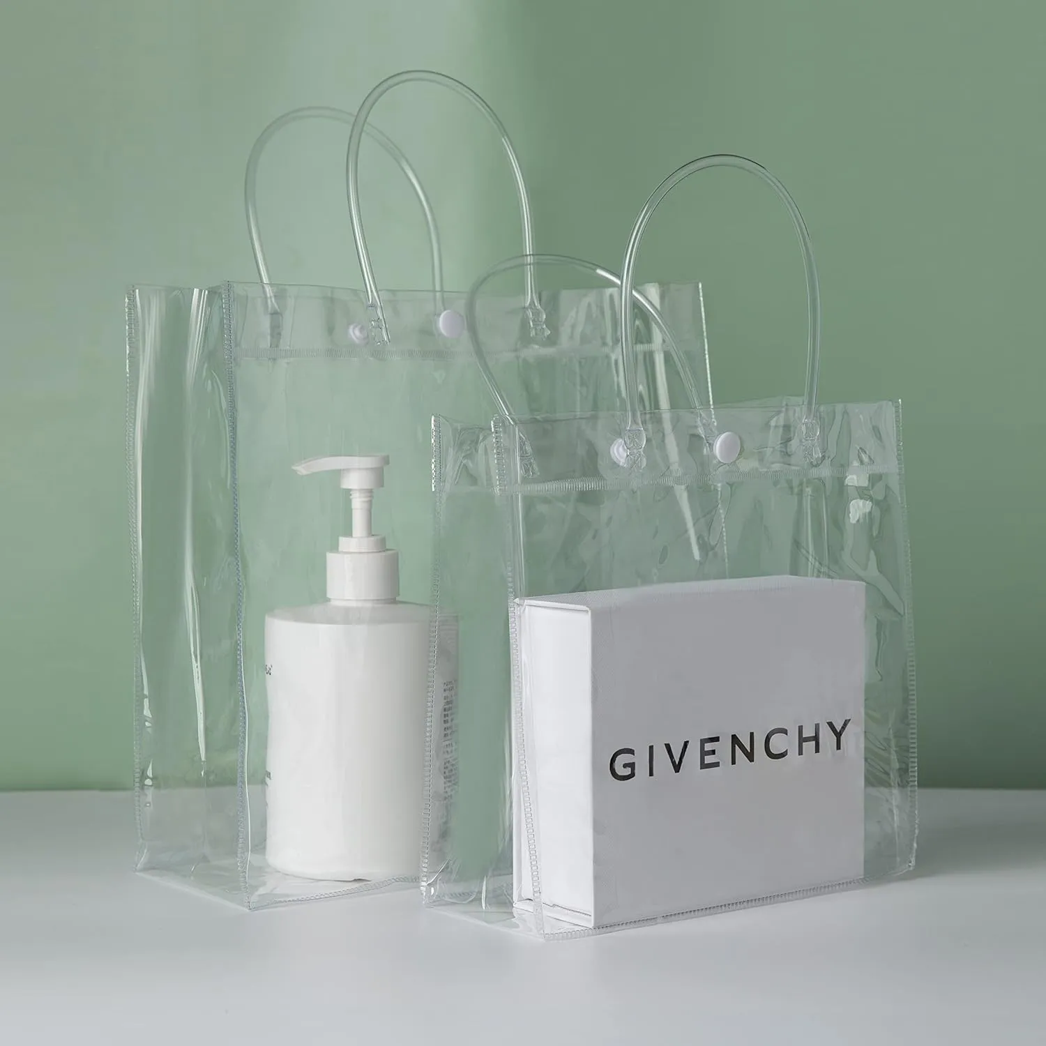 SHIPKEY 10 Pack 8”x4”x11” Clear Gift Bags, Transparent Gift Bag with Handles, Waterproof PVC Shopping Bags for Candy Perfume Boutique Gift Wedding Birthday Party Favor (20x10x28cm)